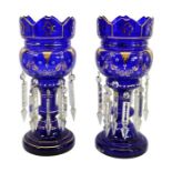 A pair of 19th century Bohemian blue glass and enamelled lustres