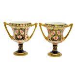 A pair of Royal Crown Derby Imari twin handled vases