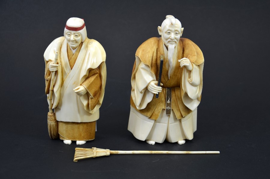 λ A pair of 19th century Japanese carved ivory okimonos