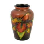 A small Moorcroft Flambe Frilled Orchid vase