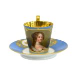 A Sevres style portrait cup and saucer