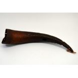 A tribal carved horn