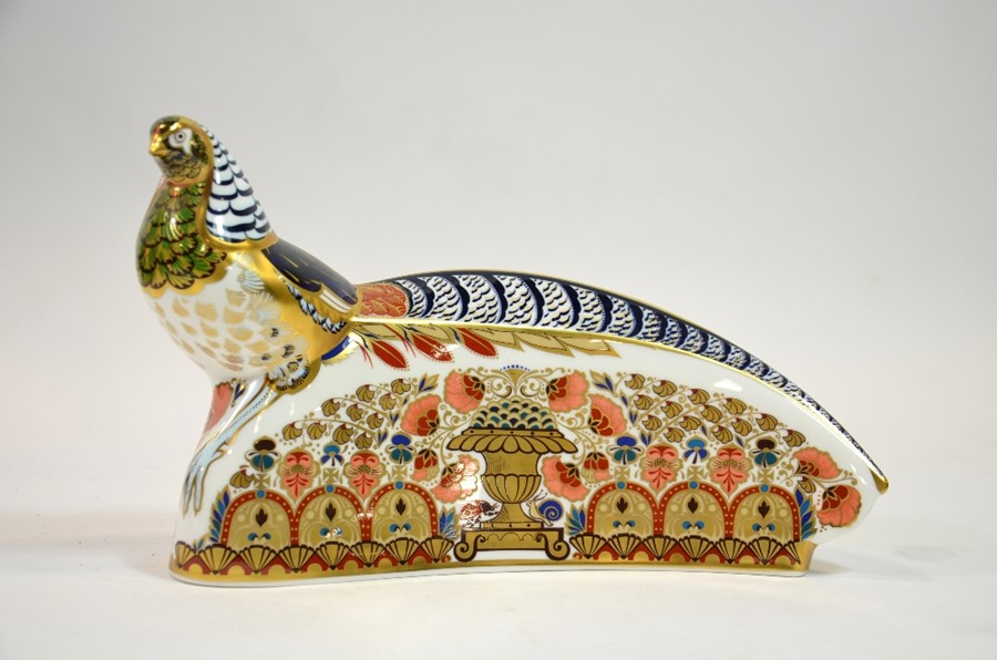 A Royal Crown Derby paperweight modelled as a Lady Amherst Pheasant