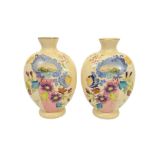 A pair of 19th century enamelled glass vases