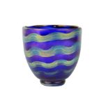 An iridescent art glass vase, of footed bowl form