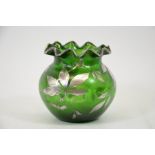 A silver overlaid green glass vase