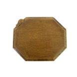 Robert Mouseman Thompson of Kilburn, a carved oak cheese or bread board