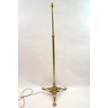 An Arts and Crafts brass and electroplated standard lamp