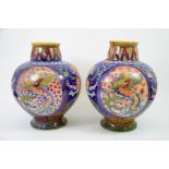 A pair of Italian faience lustre vases