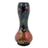 William Moorcroft, a large Pomegranate on blue double gourd vase