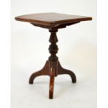 A miniature Victorian mahogany tilt top pedestal table