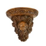 A 19th century cared walnut wall bracket, French, Henri II style