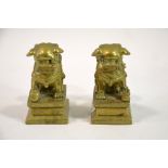 A pair of Oriental gilt bronze shishi or Fu dogs