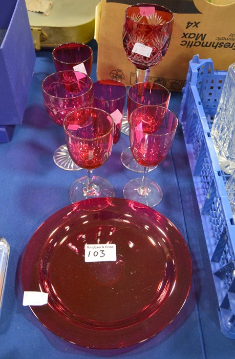 A collection of Victorian and later cranberry glass stemware