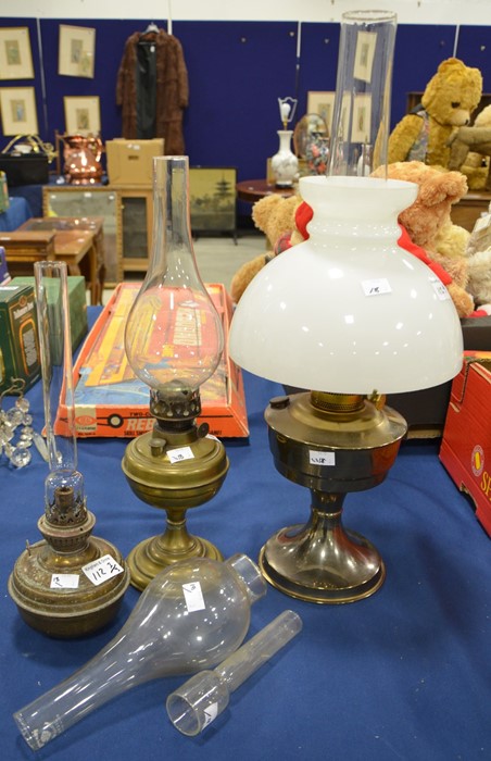 Three glass oil lamps