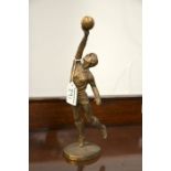 A Geanne Rynhart, bronze figure of a footballer