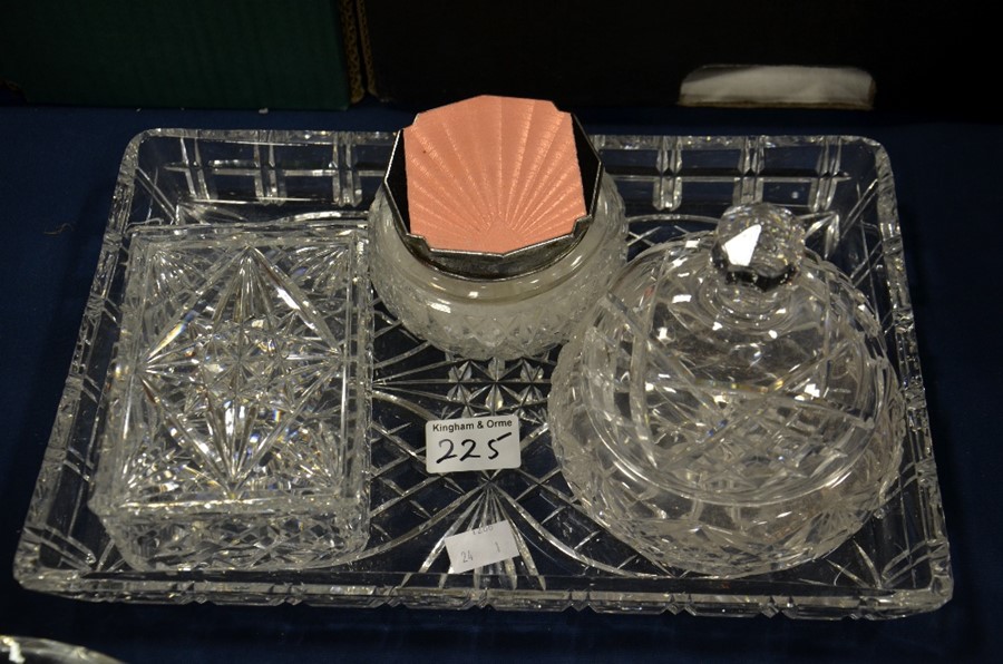 A cut glass dressing table set including tray and boxes