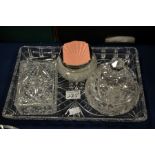 A cut glass dressing table set including tray and boxes