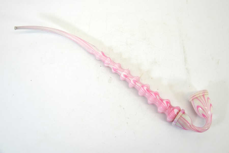 A Nailsea glass pipe, pink and white opaque