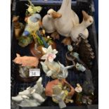 A collection of ornaments including Country Artists, Lladro style