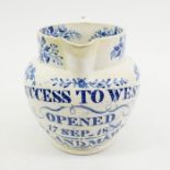 A Victorian blue and white measuring jug, Success to West Opened 17 Sep 1836 Auckland Market, 12cm h