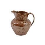 A very large salt glazed jug in lustrous brown glaze