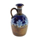 A Doulton Lambeth artware whisky ewer with blue glazed top, impressed marks to base and GRANT MACKAY