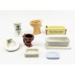 A collection of sample toilet and bathroom miniatures, including salt glaze toilet by Gates & Green