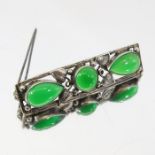 A Scandinavian Secessionist silver and green stone brooch