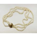 A triple sting pearl necklace