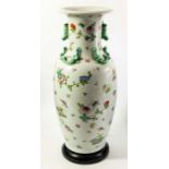 A large Chinese famille rose vase on stand