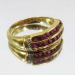 A ruby and diamond ring, set in 18 carat gold