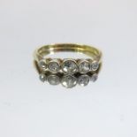 A five stone diamond and 18 carat gold ring