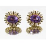 A pair of amethyst and diamond cluster earrings