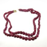 A double strand ruby necklace