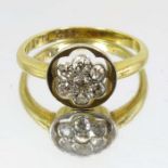 An 18 carat gold and diamond cluster ring