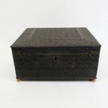 A 19th century Anglo Indian ebony and bone carved box