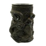 A large Chinese lignite or black lacquer resin brush pot