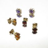 Three pairs of gem stud earrings
