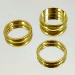 Three 22 carat gold wedding bands