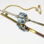 An aquamarine and diamond bar brooch