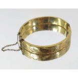 A 9 carat gold bangle