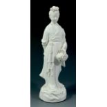 A Chinese Blanc de Chine figure of Guanyin