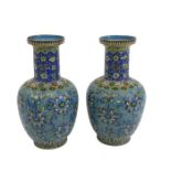 A pair of Chinese cloisonne vases