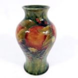 William Moorcroft for Liberty and Co., a Pomegranate on ochre vase