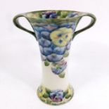 William Moorcroft for James MacIntyre, a Pansy on white vase