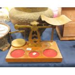 A set of Inland letter brass postal scales on maho