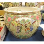 A famille rose fish bowl decorated with panels of