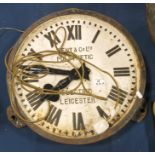 A cast metal wall mounted clock Gent & Co Limited