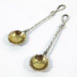 A pair of George III silver salt spoons